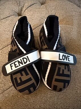 New Fendi toddler Black, Brown & White FF Logo Slip-On Sneakers with LOVE Strap.